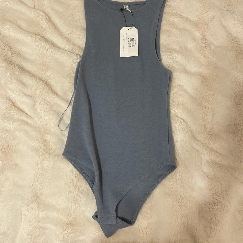 Super cute body suit